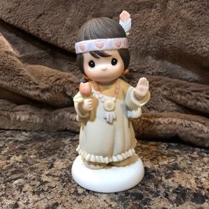 Precious moments figurine “Bless um you”.